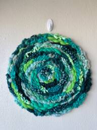 Green Goddess 19-Inch Round Woven Wall Hanging