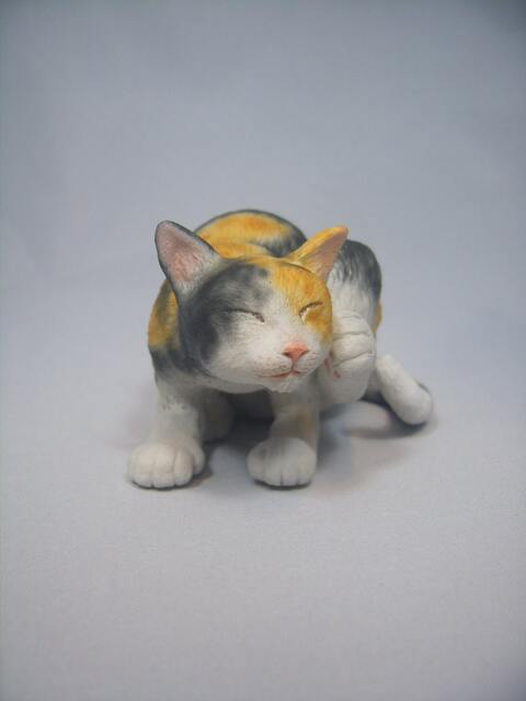 Cat Scratching Head(Cat Figurine - image 1