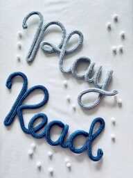 Knitted Wire Word Sign Read Play Wild - Nursery Wall Decor - thumbnail 1