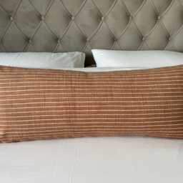 Long Terracotta Bolster Pillow Cover With An Organic Cotton Envelope Reverse - thumbnail 3