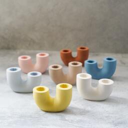 U Shaped Concrete Candlestick Holder With Twisted Candle - thumbnail 2
