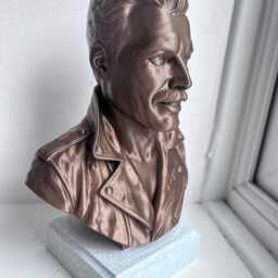 Freddie Mercury Bust - 20cm Bronze Effect Sculpture On White Stone Base - thumbnail 2