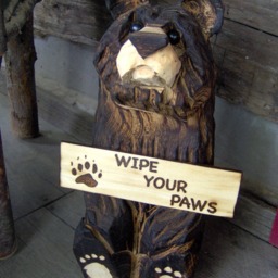 Chainsaw Carved Wood Sitting Bear With Sign - thumbnail 2