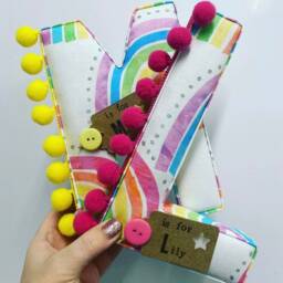 Rainbow Fabric Letter Handmade Nursery Decor With Pom Trim - thumbnail 2