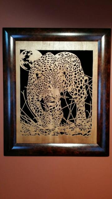 Hand Cut Wooden Portrait Of A Leopard Stalking Its Prey At Night - image 1