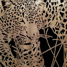 Hand Cut Wooden Portrait Of A Leopard Stalking Its Prey At Night - thumbnail 2