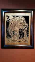 Hand Cut Wooden Portrait Of A Leopard Stalking Its Prey At Night - thumbnail 1
