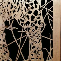 Hand Cut Wooden Portrait Of A Leopard Stalking Its Prey At Night - thumbnail 4