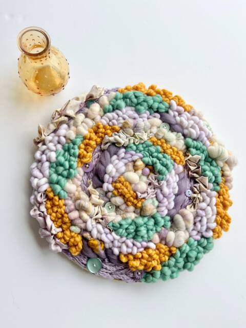 Retro Flower Garden 12-Inch Round Woven Wall Hanging - image 1