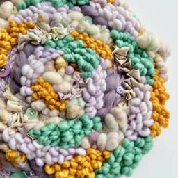 Retro Flower Garden 12-Inch Round Woven Wall Hanging - thumbnail 2