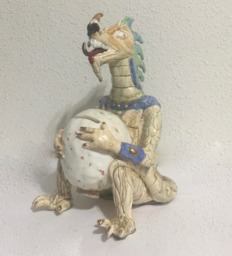 Dino Bank With A Dinosaur Ceramic Sculpture Porcelain Piggy Holding Egg For Nickels, Dimes, Quarters - thumbnail 1