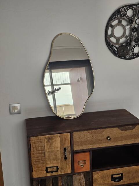 Moroccan Handmade Brass Wall Mirror in Irregular Shape - image 1