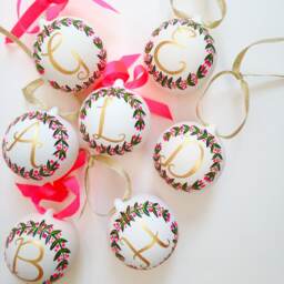 Hand Painted Alphabet Ceramic Christmas Bauble With Neon Pink Wreath Details