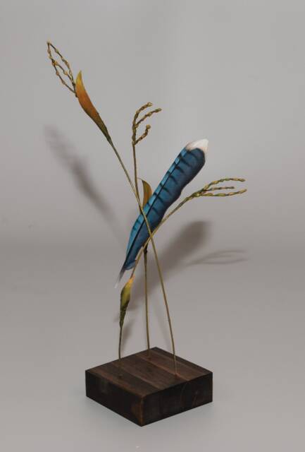 Hand-Carved Blue Jay Feather Suspended By Native Grass - image 1