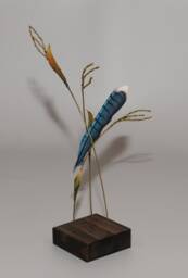 Hand-Carved Blue Jay Feather Suspended By Native Grass