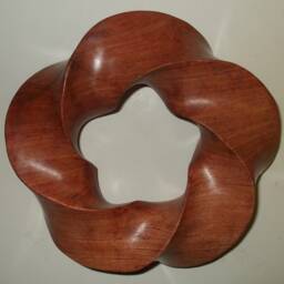 Carved Torus Knots in Wood & Stone - thumbnail 4