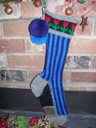 Hand Knit Christmas Stocking Gray Blue Vertical Stripe Flower Detail By Santa's Works