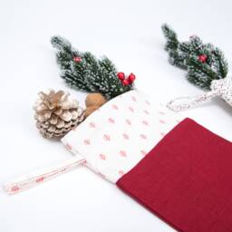 Red Linen Christmas Stocking With Printed Cuff. Zero Waste Packaging - thumbnail 2