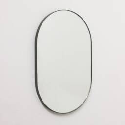 Capsula??? Capsule Shaped Minimalist Mirror With Bronze Patina Frame - thumbnail 2