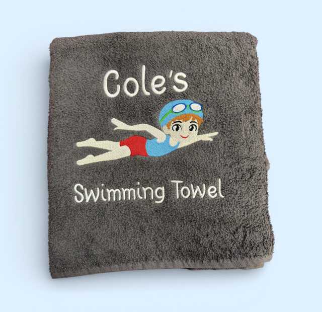 Personalised Embroidered Swimming Towel, Boy Swimmer Design - image 1