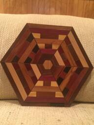 Hexagon Shaped Wood Wall Art Sculpture Featuring A Variety Of Exotic Pieces Geometrically Arrayed