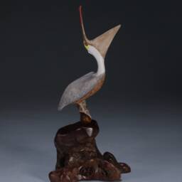 Pelican Sculpture By John Perry Laughing 7In Tall On Polished Burlwood Base - thumbnail 2