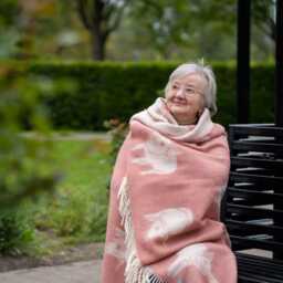 Piglet Wool Throw - Cozy Pink Blanket With Tassels For Chair, Bed & Sofa - thumbnail 2