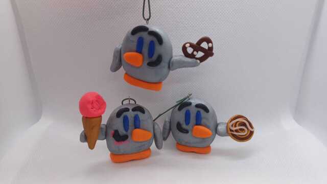 Polymer Clay Penguins With Food Ornaments - image 1