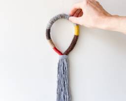 Macrame Rope Tassel Wall Decor, Wrapped Macrame Loop Hanging, Fringed Mural Art, Grey Knotted Fiber Art - thumbnail 1