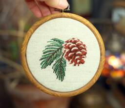 Pine Cone Embroidery Hoop, Woodland Decor in Faux Wood Frame - thumbnail 1