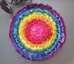 Bright Textured Rainbow Disc Coiled Jute Fiber Wall Hanging - Made With A Wide Variety Of Different Yarns - thumbnail 1