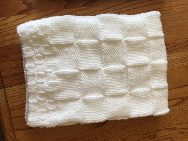 New Born This Is A Hand Knitted Baby Blanket in Pink, Blue Or White. It 25 Inches By Inches. Perfect Size For Stroller - image 1