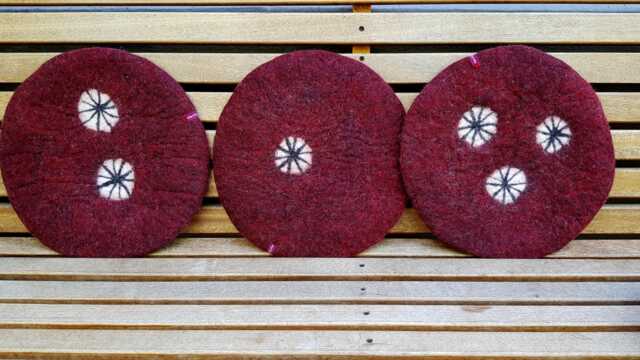 Handfelted Seat Cushion With White Wheels, Dark Red - image 1