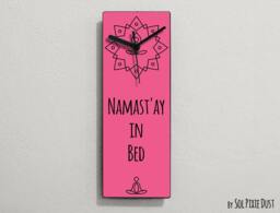 Namast'ay in Bed/Namaste in Namastay Bed - Pink Funny Wall Clock