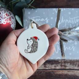 Hedgehog With Santa Hat, Handmade Ceramic Christmas Decoration, Gift For Lover, Xmas Bauble - thumbnail 3