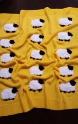 Hand-Knitted Baby Blanket With Sheep