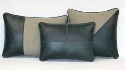 A Collection Of Leather & Wool Cushions