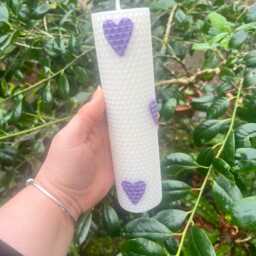 White Hand Rolled Beeswax Pillar Candle With Purple Heart Embellishments - thumbnail 2