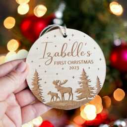 Personalised Baby's First Christmas Tree Bauble - Round Wooden Ornament With Forest & Winter Moose Design - thumbnail 1