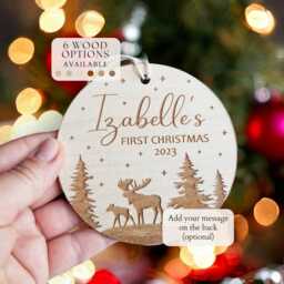 Personalised Baby's First Christmas Tree Bauble - Round Wooden Ornament With Forest & Winter Moose - thumbnail 1