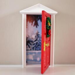 Miniature Wooden Red Christmas Elf Door With Wreath Which Opens To North Pole Image & Options Of Mail Box Miniature Mat - thumbnail 1