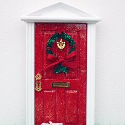 Miniature Wooden Red Christmas Elf Door With Wreath Which Opens To North Pole Image & Options Of Mail Box Miniature Mat - thumbnail 2