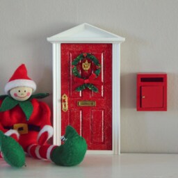 Miniature Wooden Red Christmas Elf Door With Wreath Which Opens To North Pole Image & Options Of Mail Box Miniature Mat - thumbnail 3