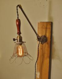 Vintage Industrial Cage Light Sconce - Machine Age Minimalist Pendant Trouble Lamp with Mounting Arm - thumbnail 1