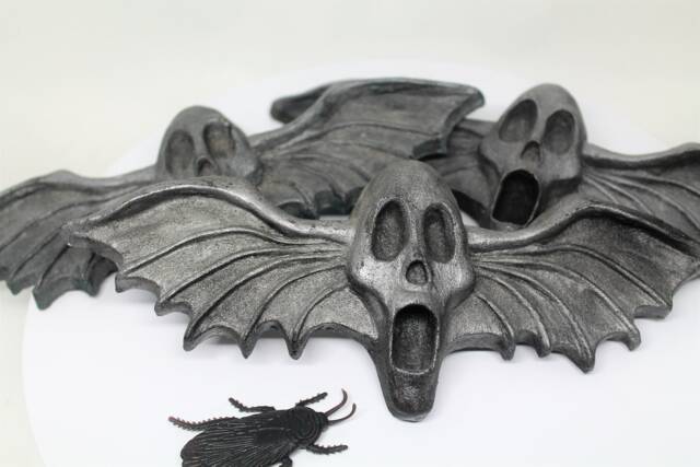 Resin Skull Magnets With Bat Wings - image 1