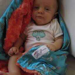 "Turquoise Dragon Brocade Baby Blanket, ""Edible Elton" - thumbnail 2
