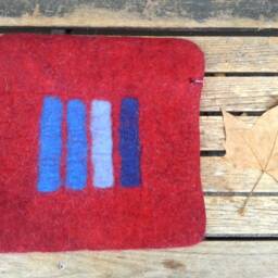 Handfelted Seat Cushion With Coloured Pattern Mix On Red - thumbnail 2