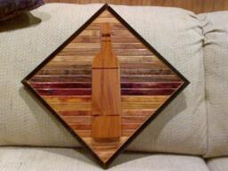 Wood Wall Art Sculpture Featuring A Hand Cut Wine Bottle Set in Oak & Pine Beveled Trim Strips Stained Variety Of Colors