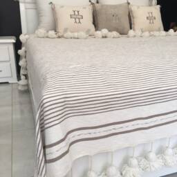 Moroccan Pompom Cotton Slub Throw Blanket With Tassels Hand Woven On A Wooden Loom, White Light Brown Stripes For Eclectic Interiors - thumbnail 4
