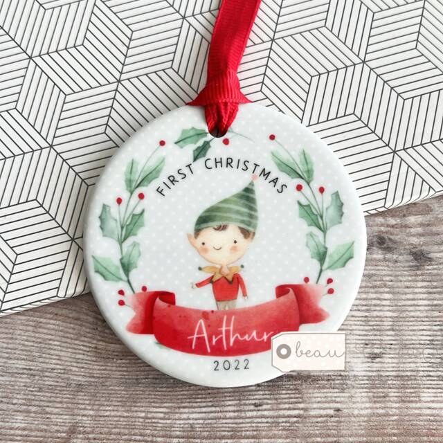 Personalised Baby Babies Baby's First Christmas Boy Girl Newborn Holly Elf Pixie Design Ceramic Round Ornament Keepsake - image 1